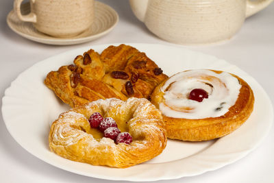 High angle view of danish pastries in plate on table