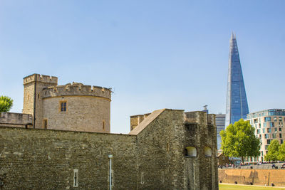 Low angle view of historic building against clear sky