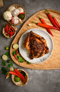 High angle view of roasted chicken on table