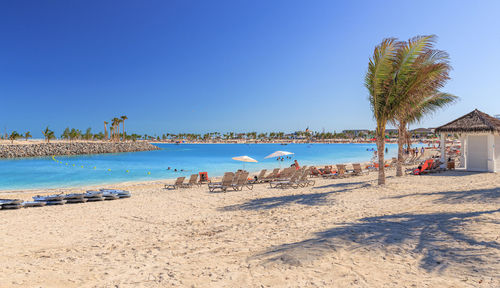 Scenic view of beach against clear sky