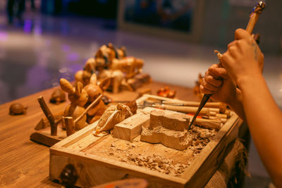 Master at work in a wooden and ceramic crafting shop in the greater bay area