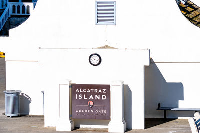 Information sign on wall of building