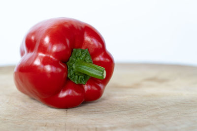 Close-up of red bell peppers on table