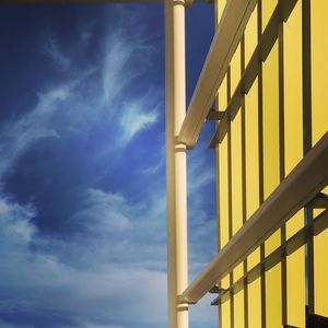 Low angle view of built structure against blue sky