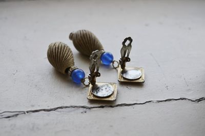 High angle view of earrings on table