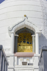 Low angle view of cross on building