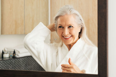 Young woman using laptop at home