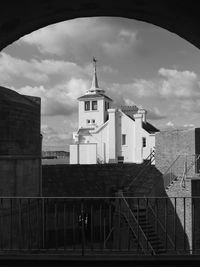 Low angle view of bell tower against sky