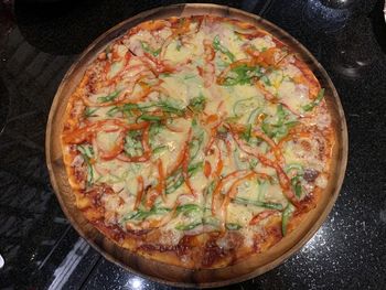 High angle view of pizza on table
