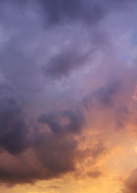 Low angle view of cloudy sky during sunset