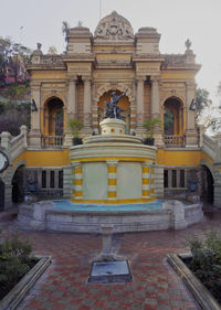 Fountain in front of historic building