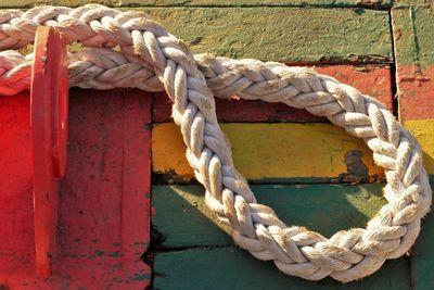 Close-up of rope tied on metal