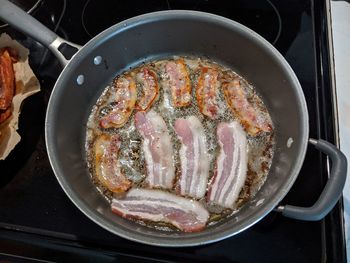 Close-up of meat in cooking pan