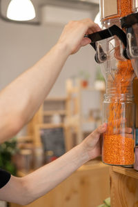 Midsection of woman preparing food