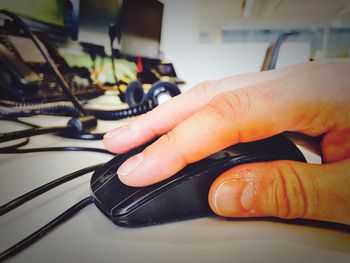 Close-up of hands using mobile phone