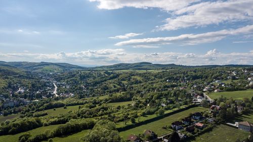 High angle view of trees on landscape against sky