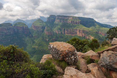 Scenic view of rock formations against sky