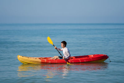 man paddling a