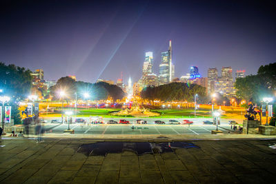 Illuminated city buildings at night