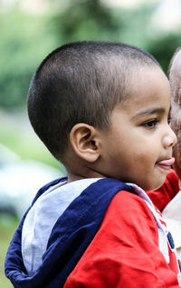 Close-up of boy looking away