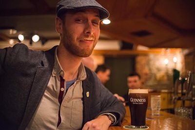 Portrait of a man with drink