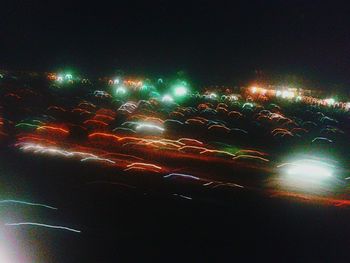 Light trails against sky at night