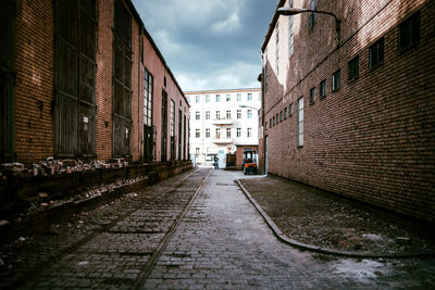 Narrow alley along buildings