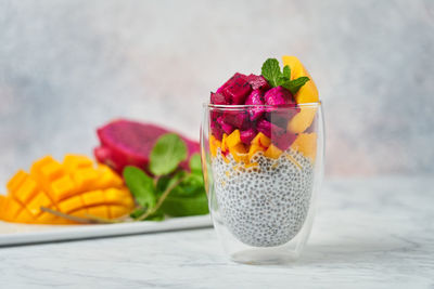 Close-up of fruits in glass on table