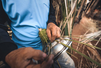 Midsection of man working