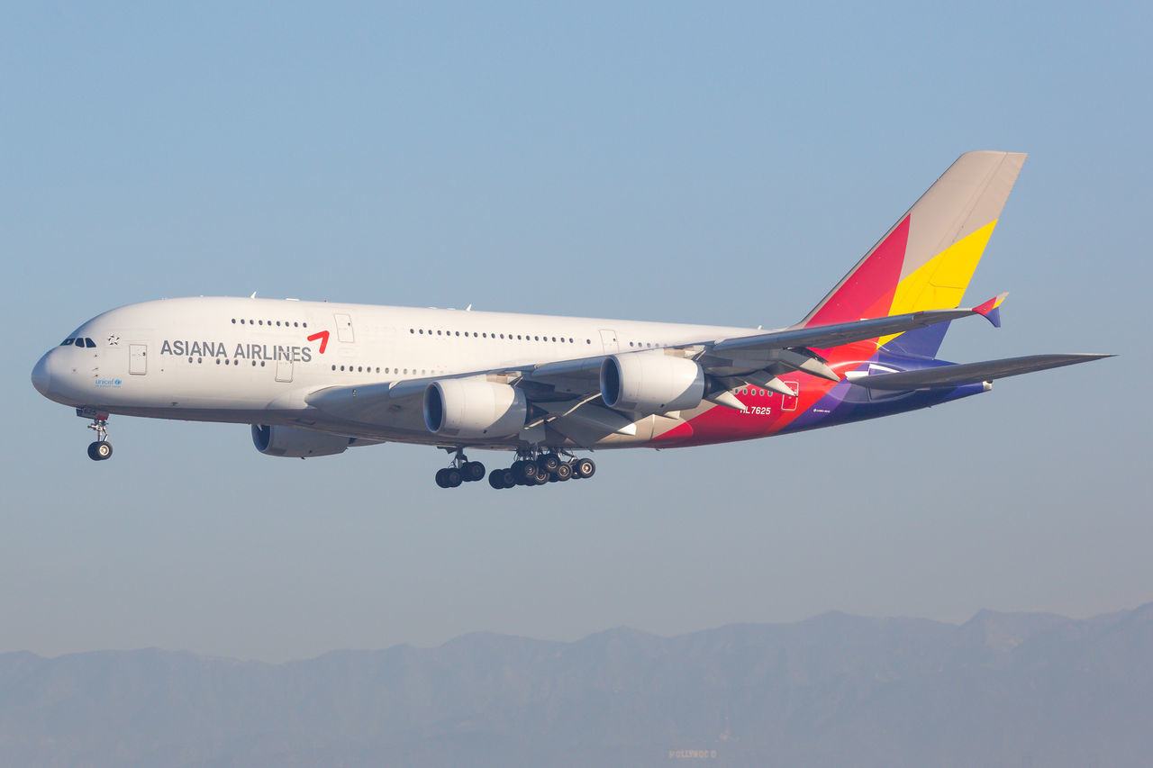 AIRPLANE AGAINST CLEAR SKY