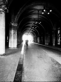 People walking in tunnel