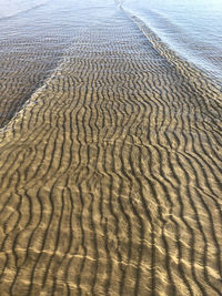 High angle view of sand dunes at beach