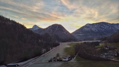 Scenic view of mountains against sky during sunset