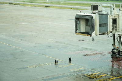 Airplane on runway against sky