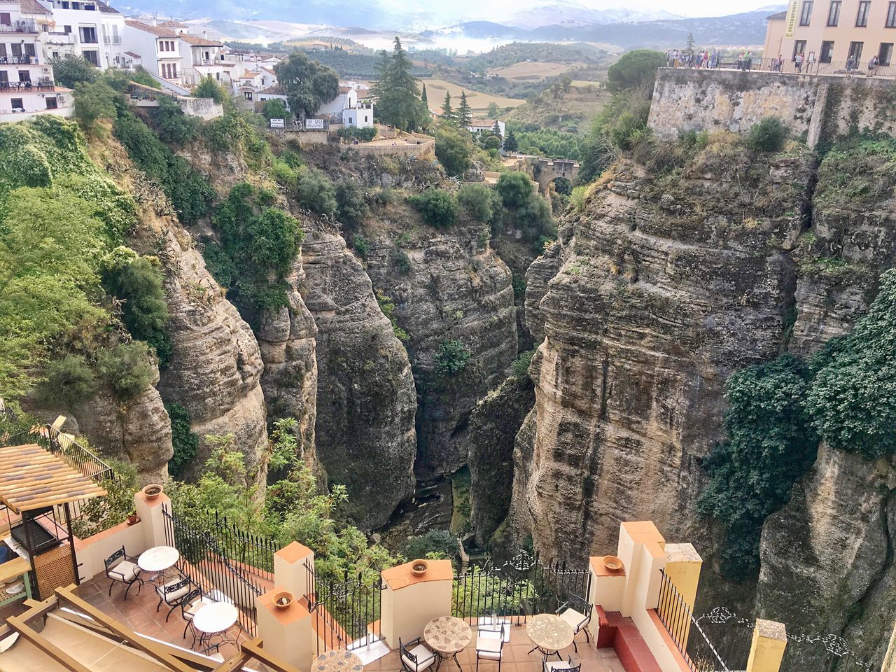 tree, architecture, built structure, travel destinations, nature, day, mountain, plant, rock formation, building exterior, high angle view, travel, tourism, cliff, rock, solid, outdoors, history, the past, building, formation