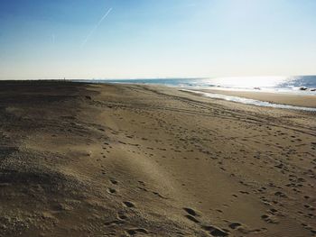 Scenic view of beach against clear sky