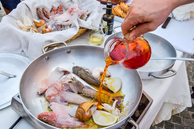 High angle view of person preparing food in kitchen