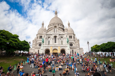 Group of people in front of historical building