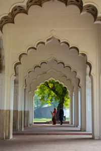 People in front of historic building