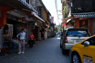 People on street in city