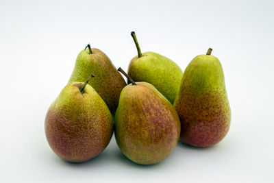 Close-up of fruits against white background