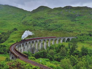 Scenic view of bridge over mountains