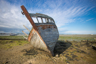 Abandoned wooden old boat wreck