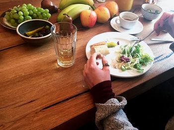 Cropped image of person having breakfast