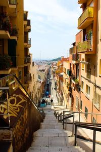 Street amidst buildings against sky