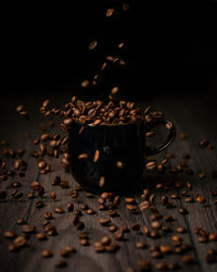 Close-up of coffee beans on table