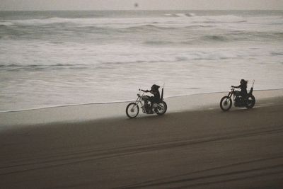 Side view of a bicycle on the beach
