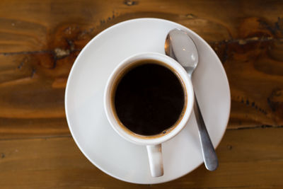 Close-up of coffee cup on table