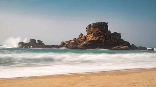 Scenic view of sea against clear sky