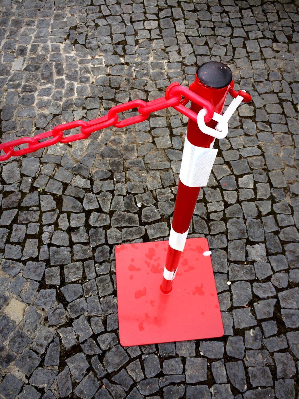 red, cobblestone, street, safety, outdoors, day, road, no people, crime scene, close-up